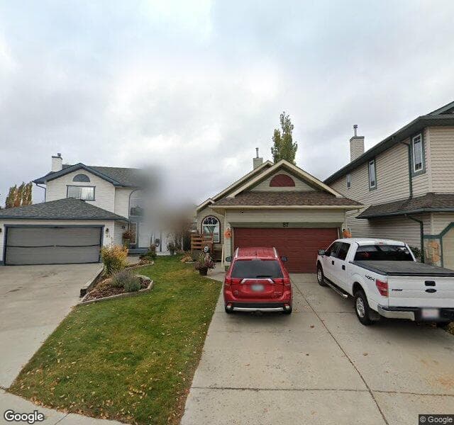 Street view of 87 Erin Grove SE, Calgary