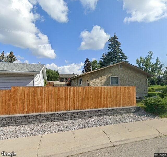 Street view of 76 Lake Wasa Green SE, Calgary