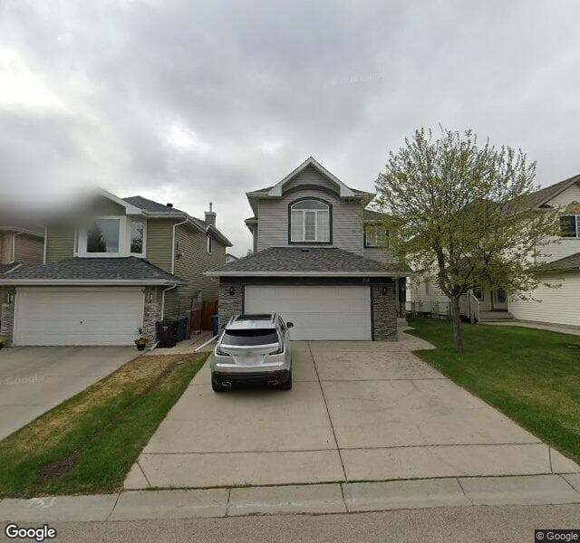 Street view of 75 Hidden Ranch Terrace NW, Calgary