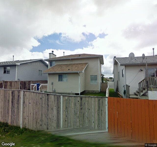 Street view of 209 Riverglen Drive SE, Calgary