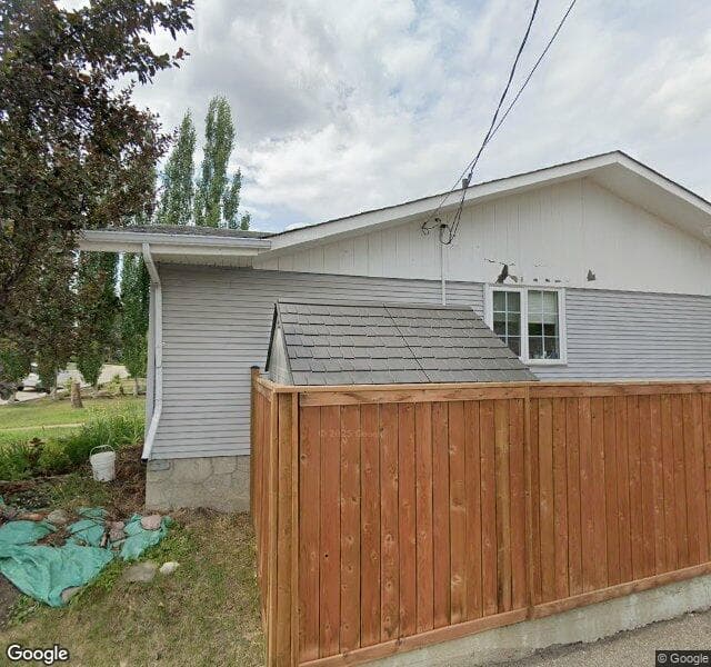 Street view of 1256 Lake Twintree Drive SE, Calgary