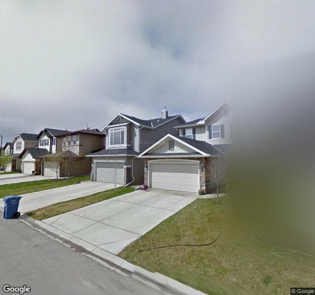 Street view of 47 Cougarstone Common SW, Calgary