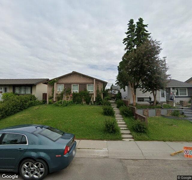 Street view of 883 Pinecliff Drive NE, Calgary