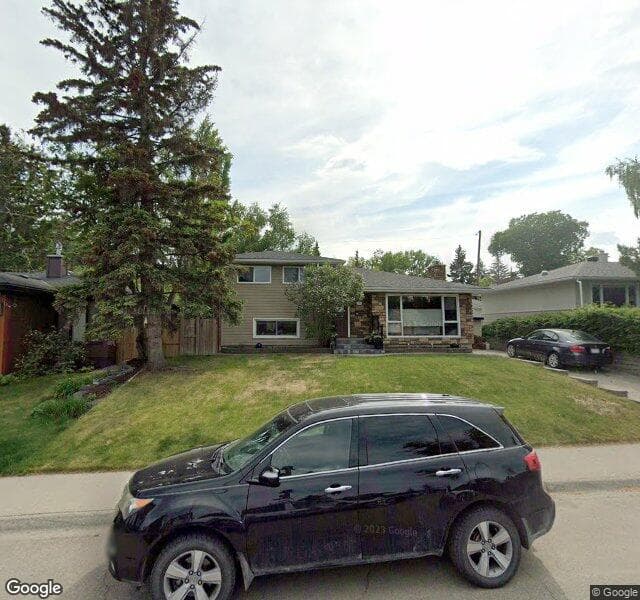 Street view of 79 Woodlark Drive SW, Calgary