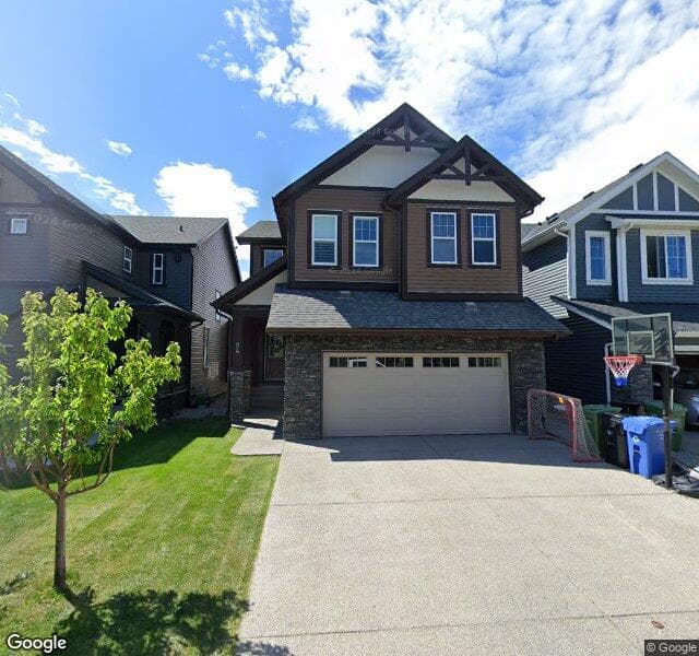 Street view of 84 Cougar Ridge Manor SW, Calgary