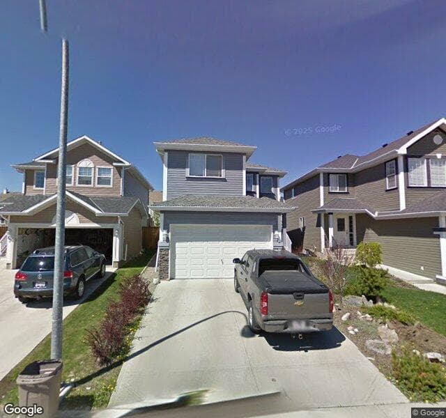 Street view of 65 Bridlepost Green SW, Calgary