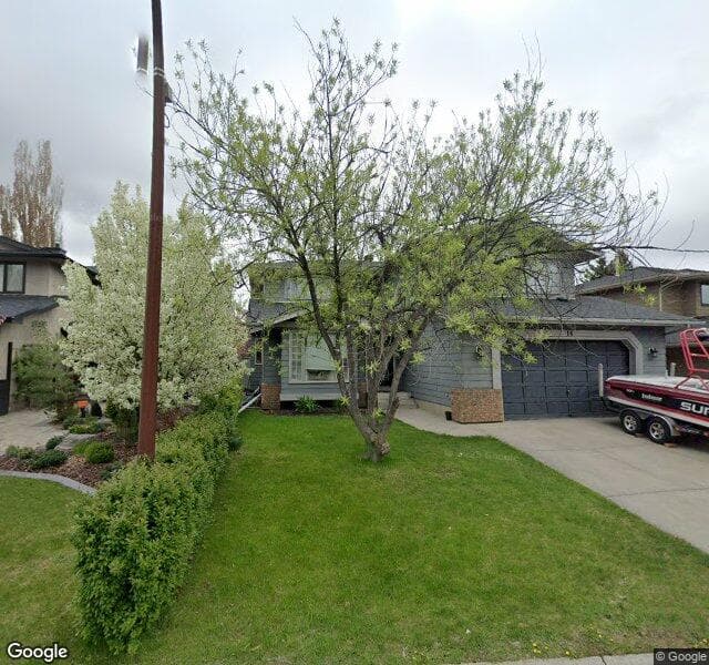 Street view of 16 Sunset Close SE, Calgary