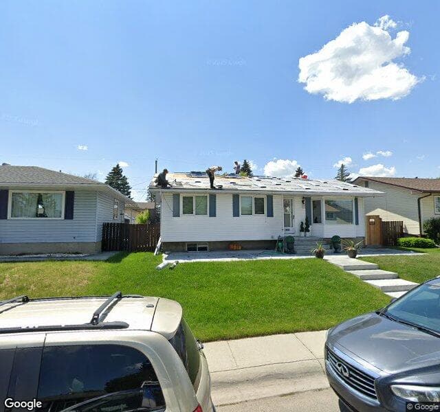 Street view of 1031 Penmeadows Road SE, Calgary