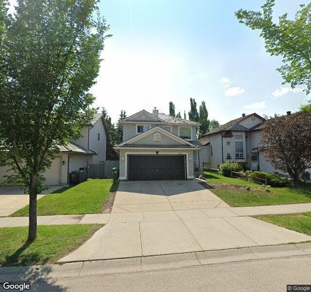 Street view of 14411 Mount Mckenzie Drive SE, Calgary