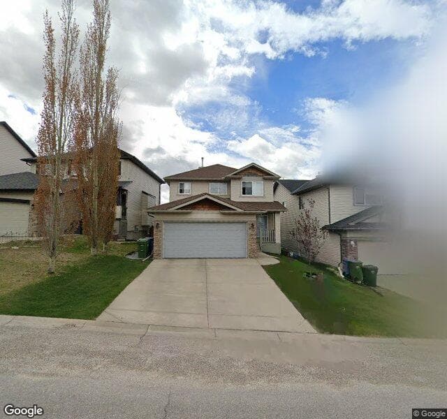 Street view of 11 Rockyspring Rise NW, Calgary
