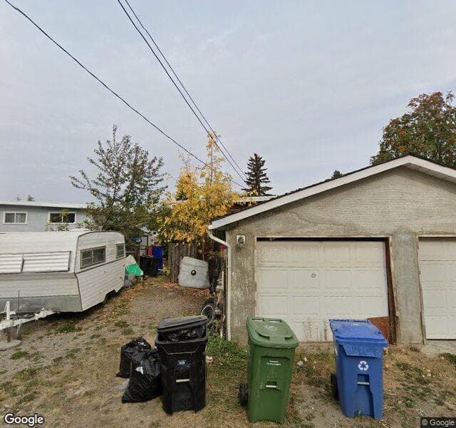 Street view of 74 Queen Isabella Close SE, Calgary