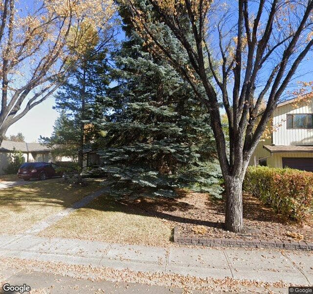 Street view of 516 Woodpark Crescent SW, Calgary