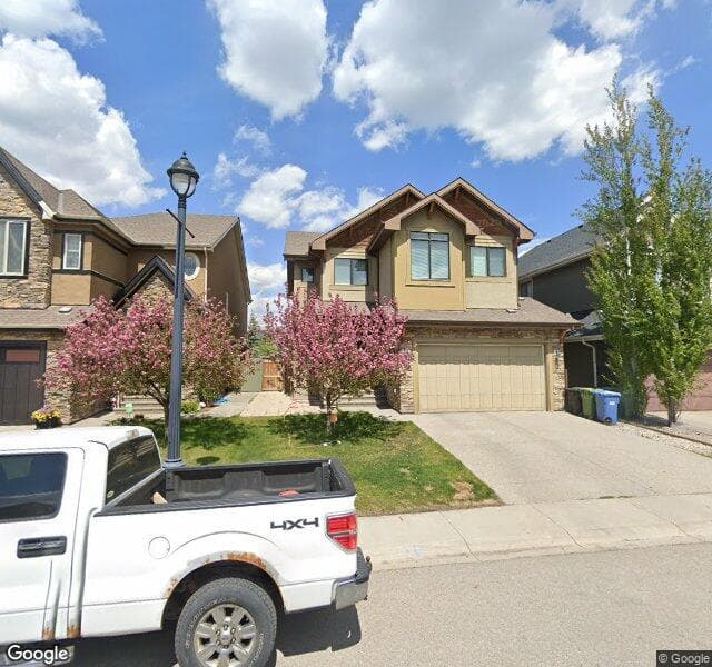 Street view of 109 W Coach Place SW, Calgary