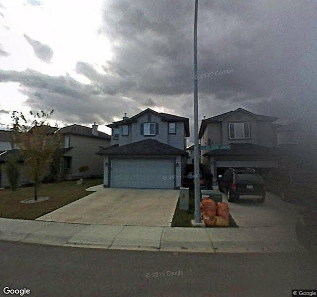 Street view of 52 Tuscany Ravine Terrace NW, Calgary