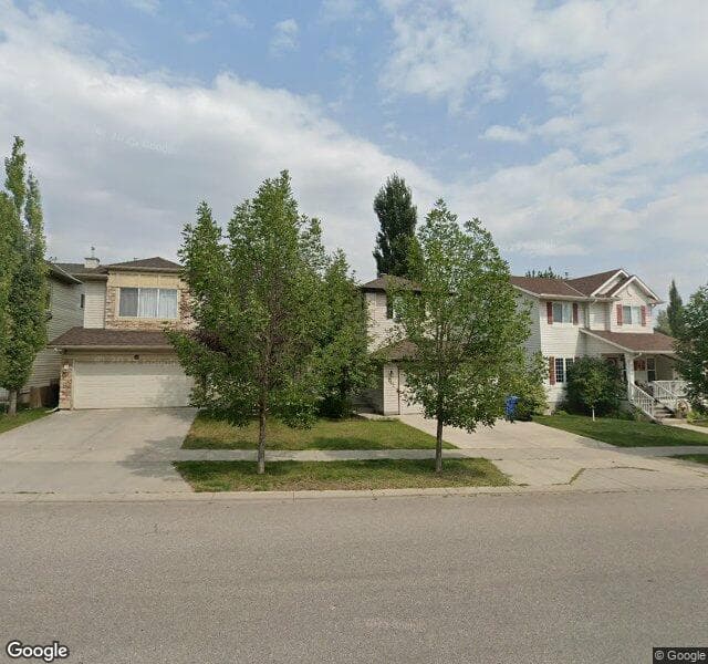Street view of 242 Tuscany Ravine Road NW, Calgary