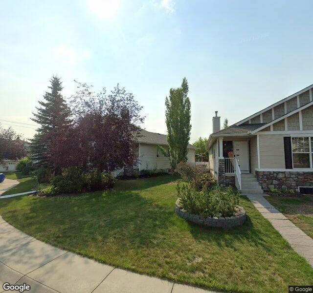 Street view of 62 W Springs Court SW, Calgary