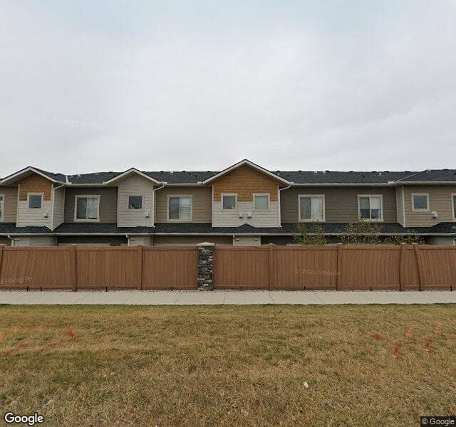 Street view of 68 Cougar Ridge Landing SW, Calgary