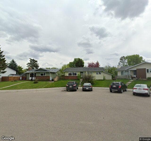 Street view of 215 Queen Anne Place SE, Calgary