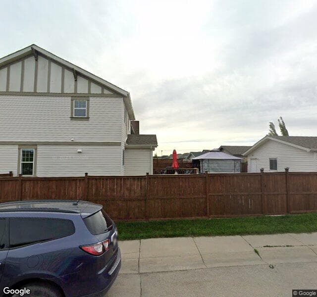 Street view of 1583 New Brighton Drive SE, Calgary