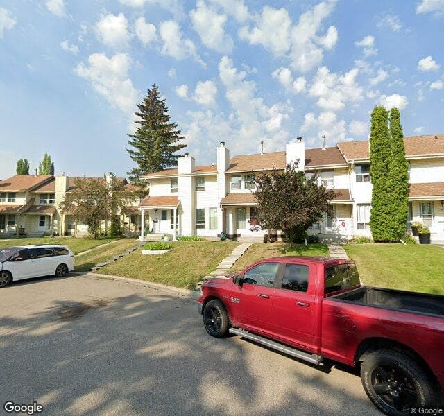 Street view of 13 Woodhill Court SW, Calgary