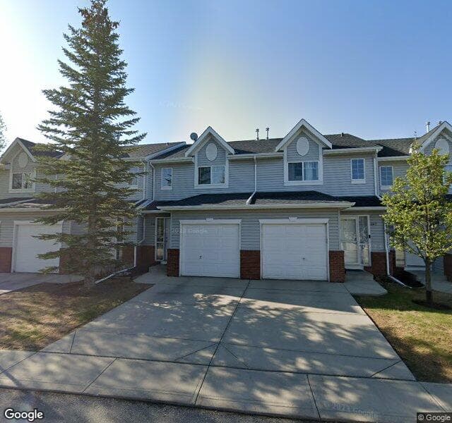 Street view of 309 Country Village Cape NE, Calgary