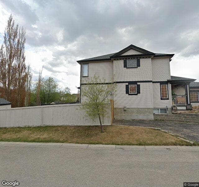 Street view of 96 Covehaven Gardens NE, Calgary