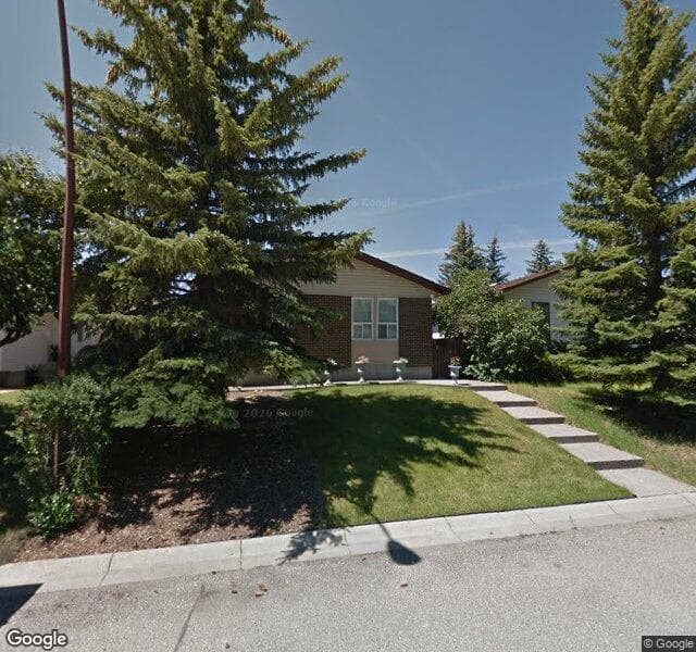Street view of 71 Woodglen Way SW, Calgary