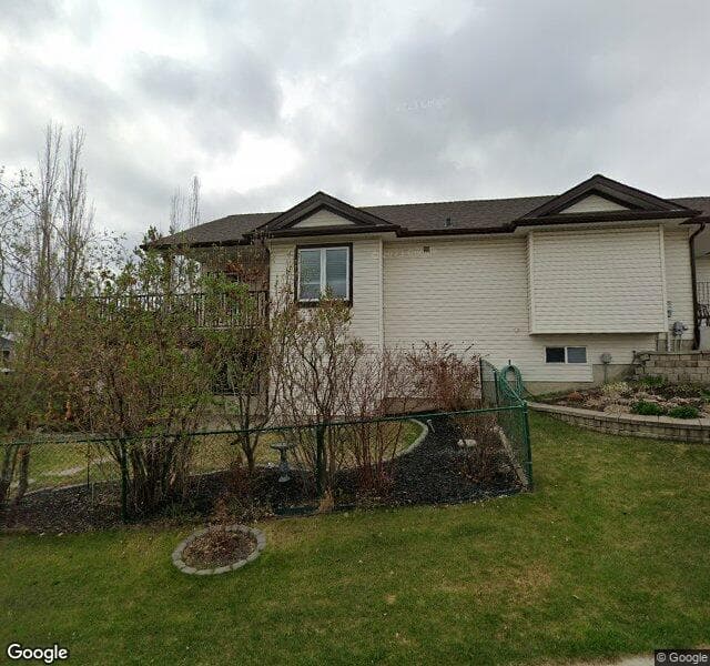 Street view of 165 Hidden Ranch Crescent NW, Calgary