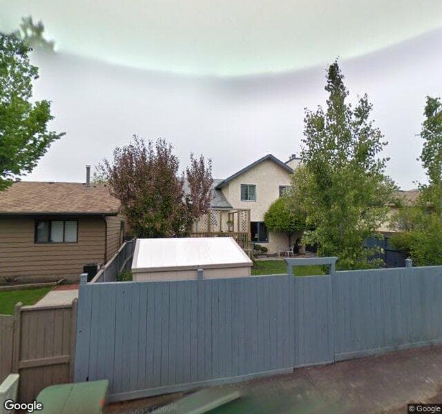 Street view of 872 Riverbend Drive SE, Calgary