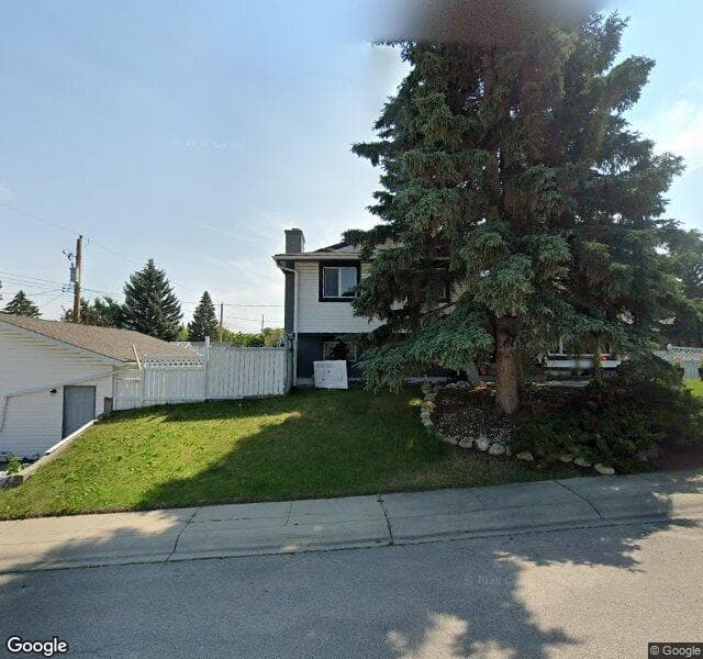 Street view of 10532 Oakmoor Way SW, Calgary