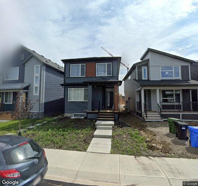 Street view of 60 Wolf Creek Gardens SE, Calgary