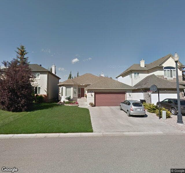 Street view of 104 Strathlea Court SW, Calgary