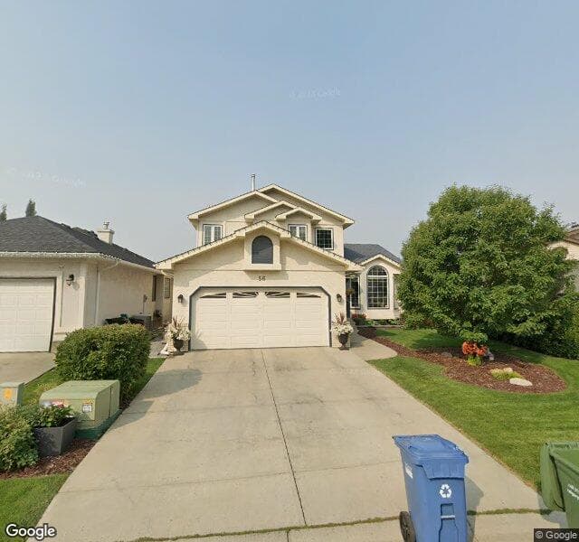 Street view of 56 Scanlon Green NW, Calgary