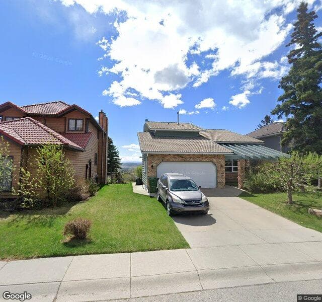 Street view of 128 Hawkview Manor Circle NW, Calgary