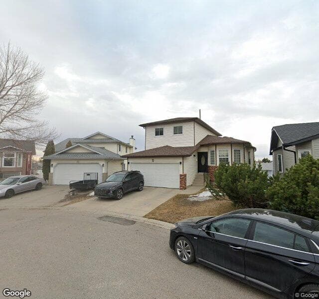 Street view of 88 Rivercroft Close SE, Calgary