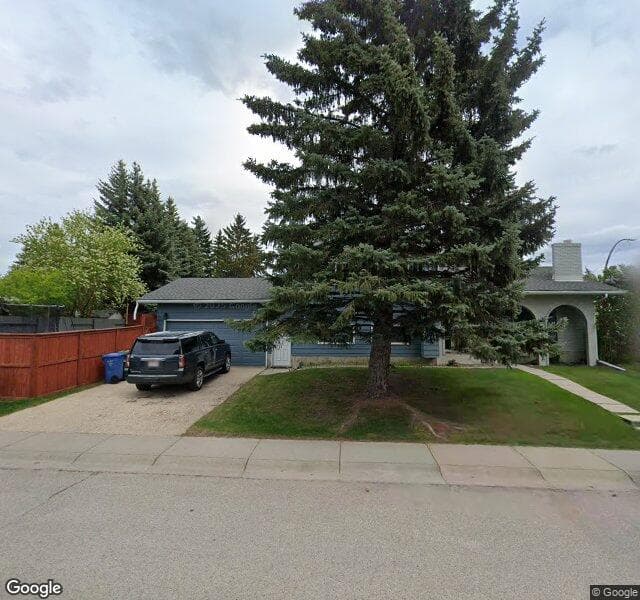 Street view of 2204 Deer Side Drive SE, Calgary