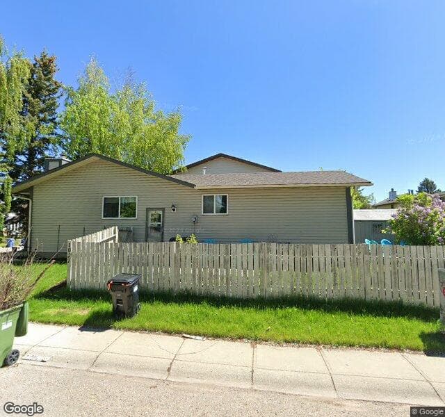 Street view of 1023 Woodview Crescent SW, Calgary