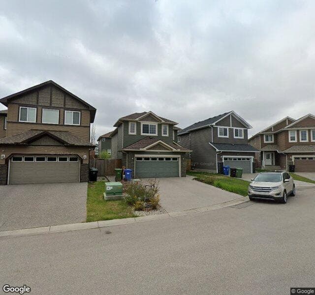 Street view of 215 Everhollow Street SW, Calgary