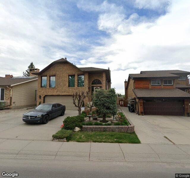 Street view of 16 Sandstone Way NW, Calgary