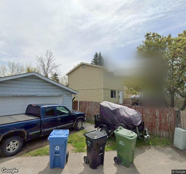 Street view of 32 Erin Ridge Place SE, Calgary