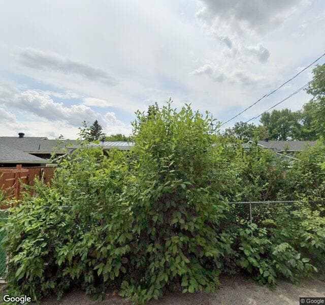 Street view of 1016 Lake Bonavista Drive SE, Calgary