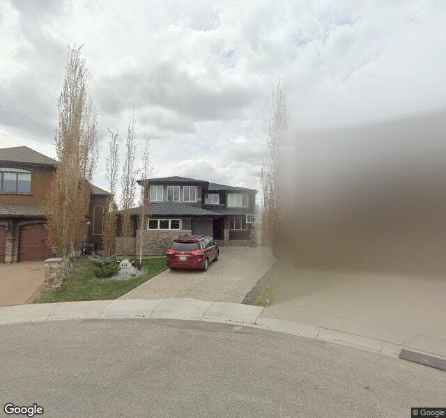 Street view of 68 Rockcliff Point NW, Calgary