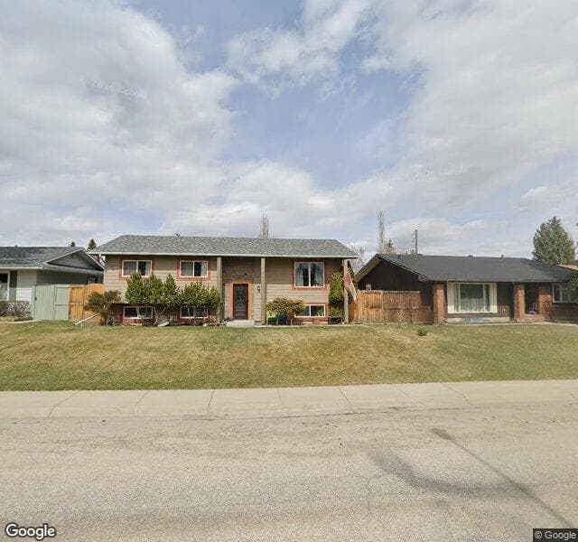 Street view of 1539 Lake Bonavista Drive SE, Calgary