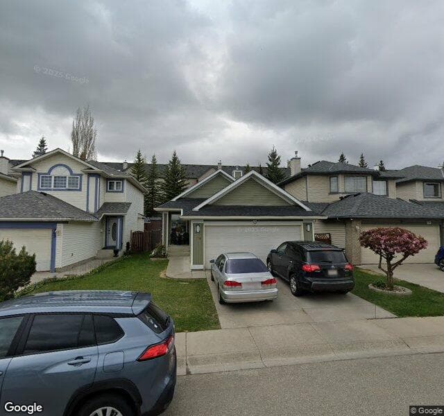 Street view of 209 Bridlecreek Park SW, Calgary