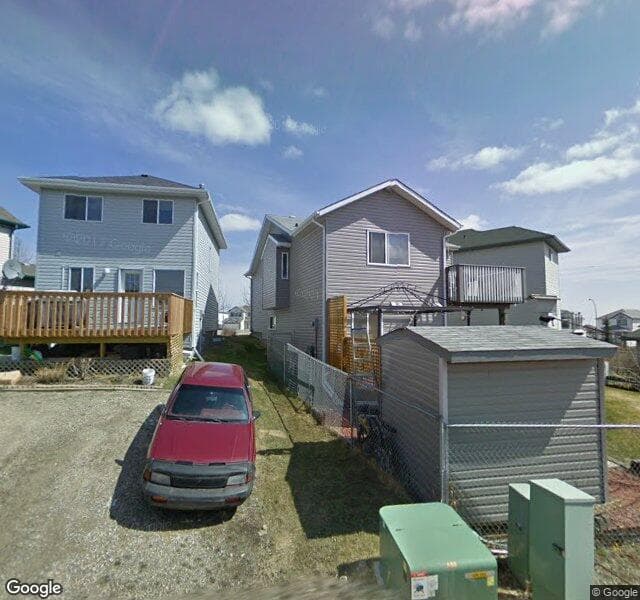 Street view of 48 Country Hills Mews NW, Calgary