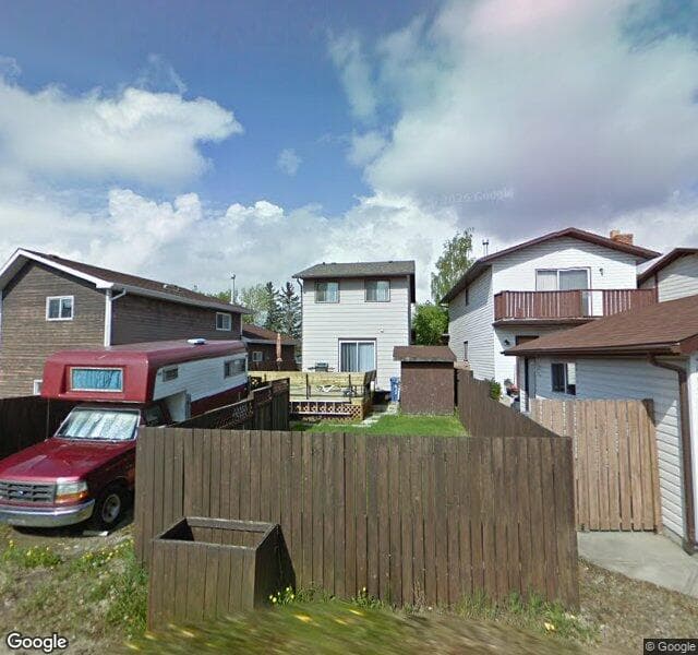 Street view of 1030 Mckinnon Drive NE, Calgary