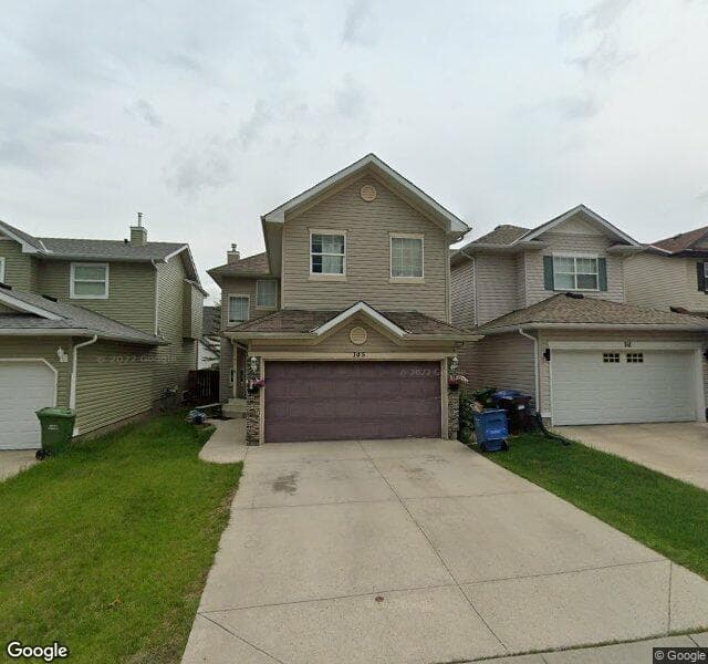 Street view of 208 Bridlewood View SW, Calgary