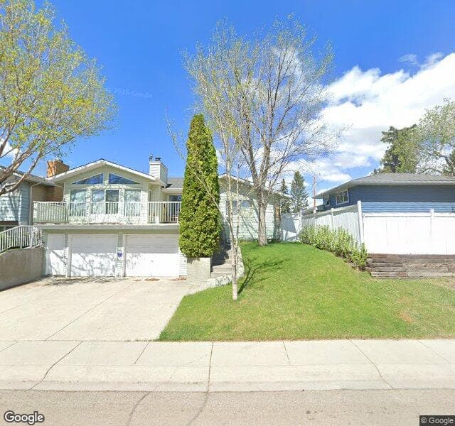 Street view of 256 Huntcroft Road NE, Calgary