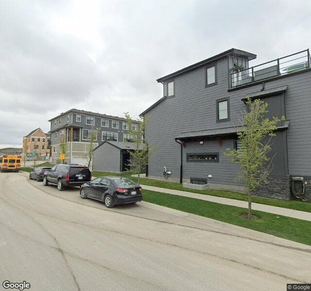 Street view of 157 Treeline Avenue SW, Calgary