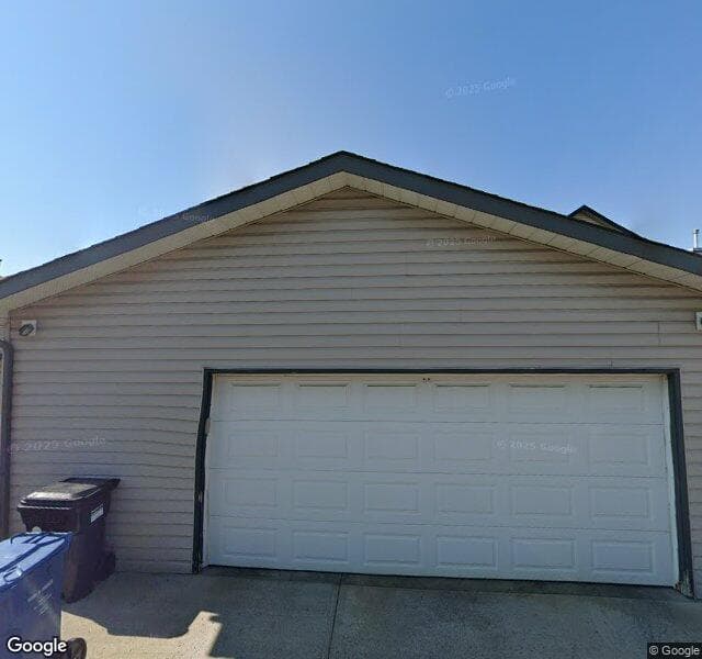 Street view of 60 Prestwick Cove SE, Calgary